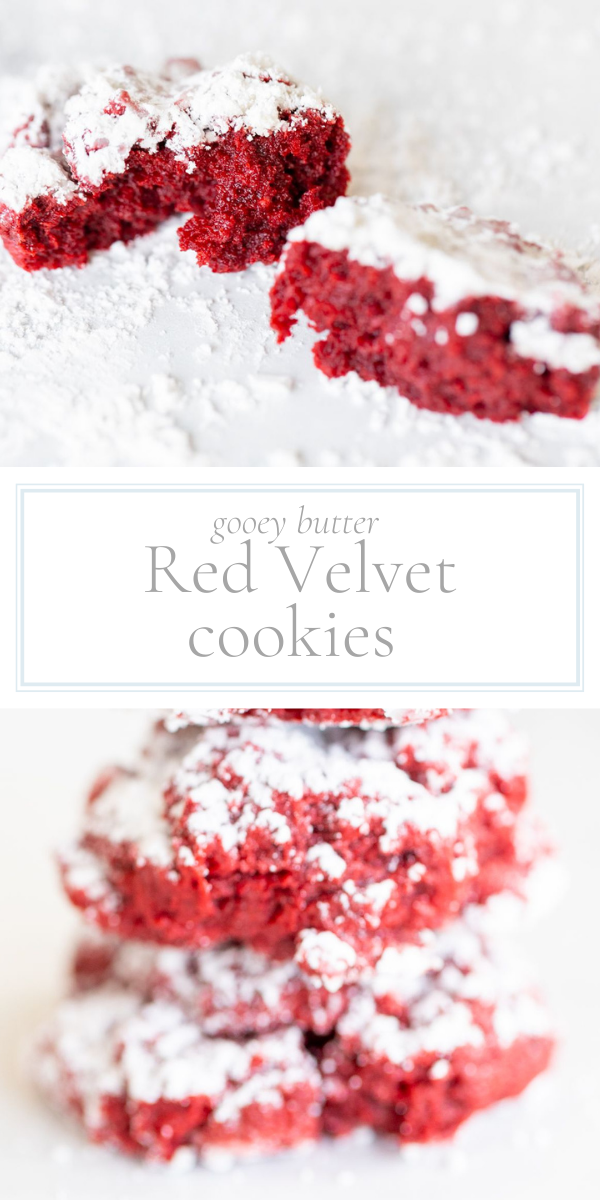 Red velvet cookies coated in powdered sugar against a white background.