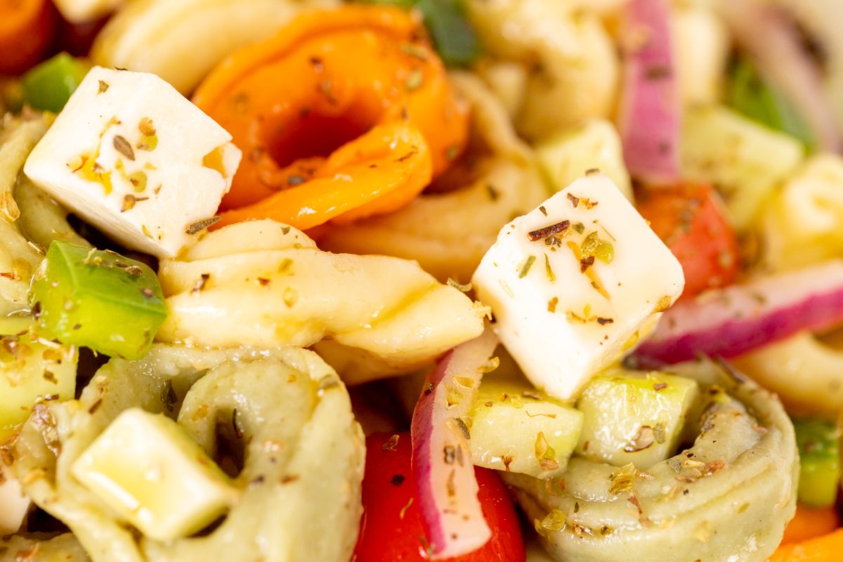 A close up of tortellini pasta salad.
