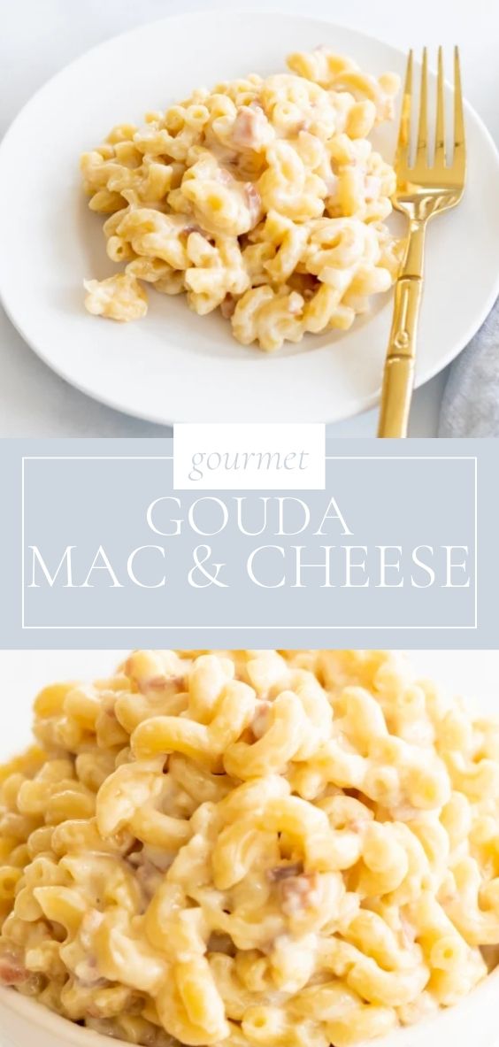 On a marble counter top, there is a round white bowl of gourmet Gouda Mac and Cheese and a golden fork.