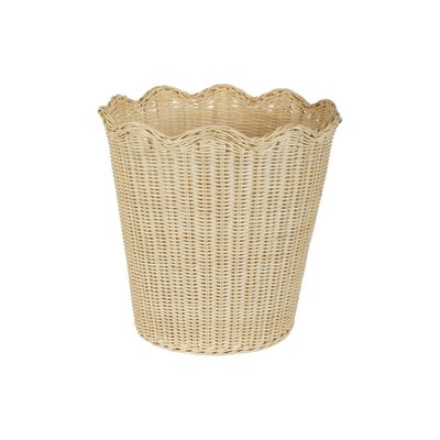 a rattan scalloped waste paper basket