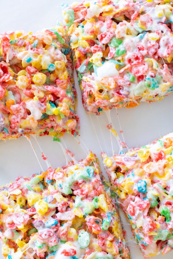 Overhead view of 4 Fruity Pebbles Treats with sticky marshmallow
