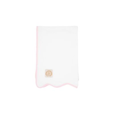 a pink scalloped hand towel bath accessory