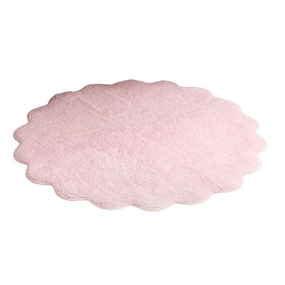 a pink scalloped bath mat