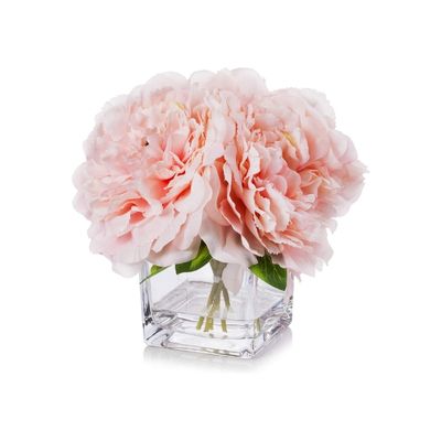 pink faux peonies in a vase in a guide to bathroom accessories