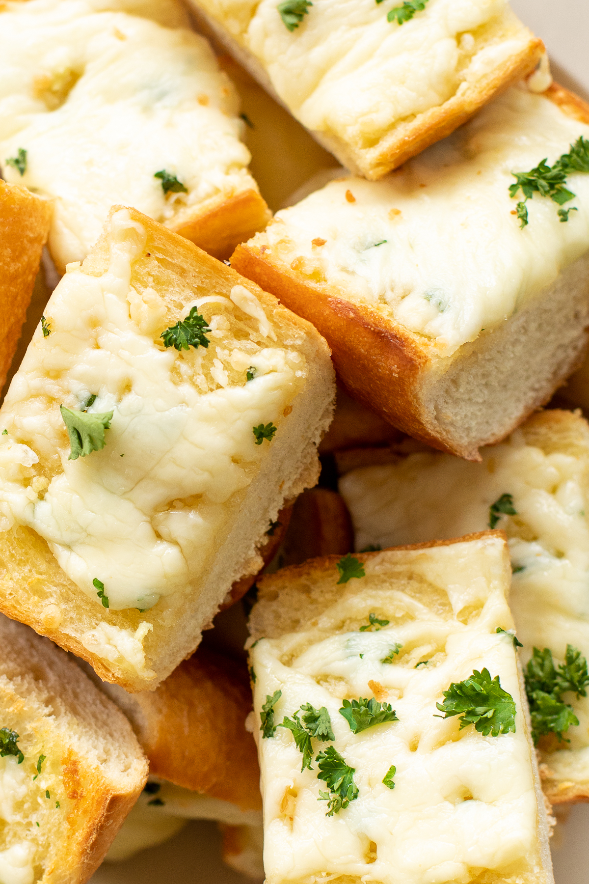 Closeup of garlic cheese bread slices