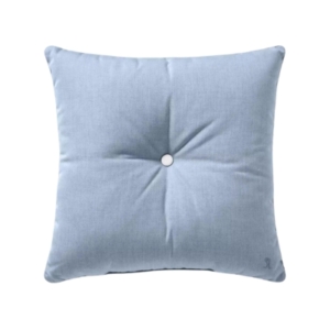 An outdoor blue pillow with a button.