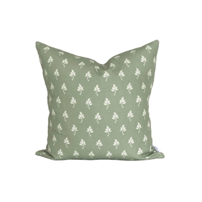 A cream and green block print patterned outdoor pillow
