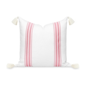 An outdoor pillow with pink stripes.