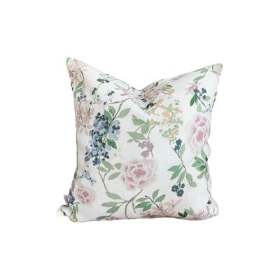 A pastel floral outdoor pillow
