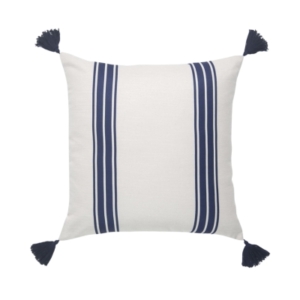 An outdoor navy and white striped pillow with tassels.
