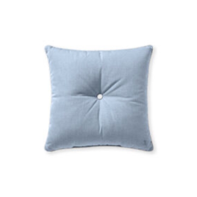 a blue outdoor pillow with a button in the center