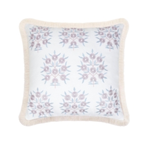 An outdoor blue and white pillow with a fringe trim.