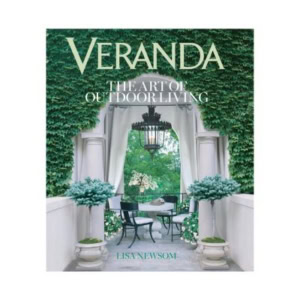 Cover of "Veranda: The Art of Outdoor Living" by Lisa Newsom, featuring a lush, ivy-covered patio with elegant outdoor furniture and potted plants—perfect for those who love decorative books that inspire beautiful spaces.