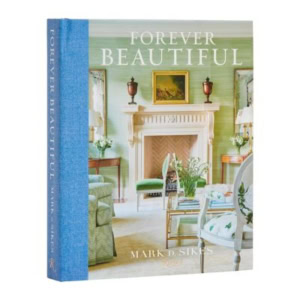 A decorative book titled "Forever Beautiful" by Mark D. Sikes, featuring a hardcover with an image of an elegant, traditionally decorated living room on the cover.
