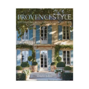 Book cover titled "Provence Style: Decorating with French Country Flair" by Shauna Varvel, featuring a house with blue shutters, topiary plants, and a balcony—perfect for fans of decorative books.