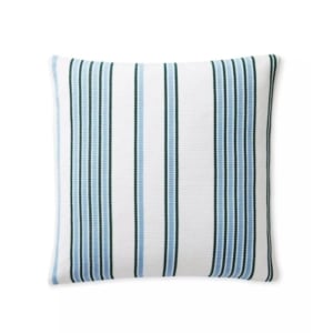 A blue and white striped pillow on a white background, similar to Serena and Lily dupes.