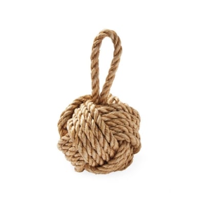 A rope ball on a white background offers a serene look.