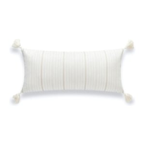 A white striped pillow with tassels that mimics the serena and lily look for less.