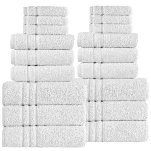 A neatly stacked set of white towels in various sizes, arranged in three columns against a plain background—perfect for adding a touch of luxury to any guest room.
