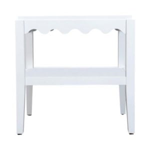 A white wooden side table with a scalloped apron and a lower shelf, perfect for adding charm to a guest room, viewed from the front.