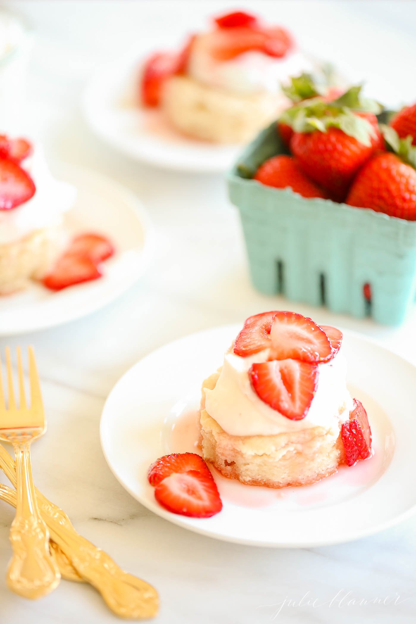 strawberry shortcake on a white plate.