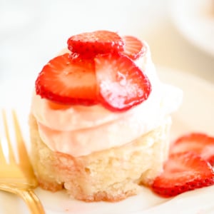 strawberry shortcake on a white plate.