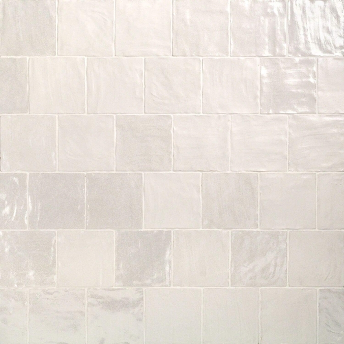 Glossy 4 inch square tile in a soft white color