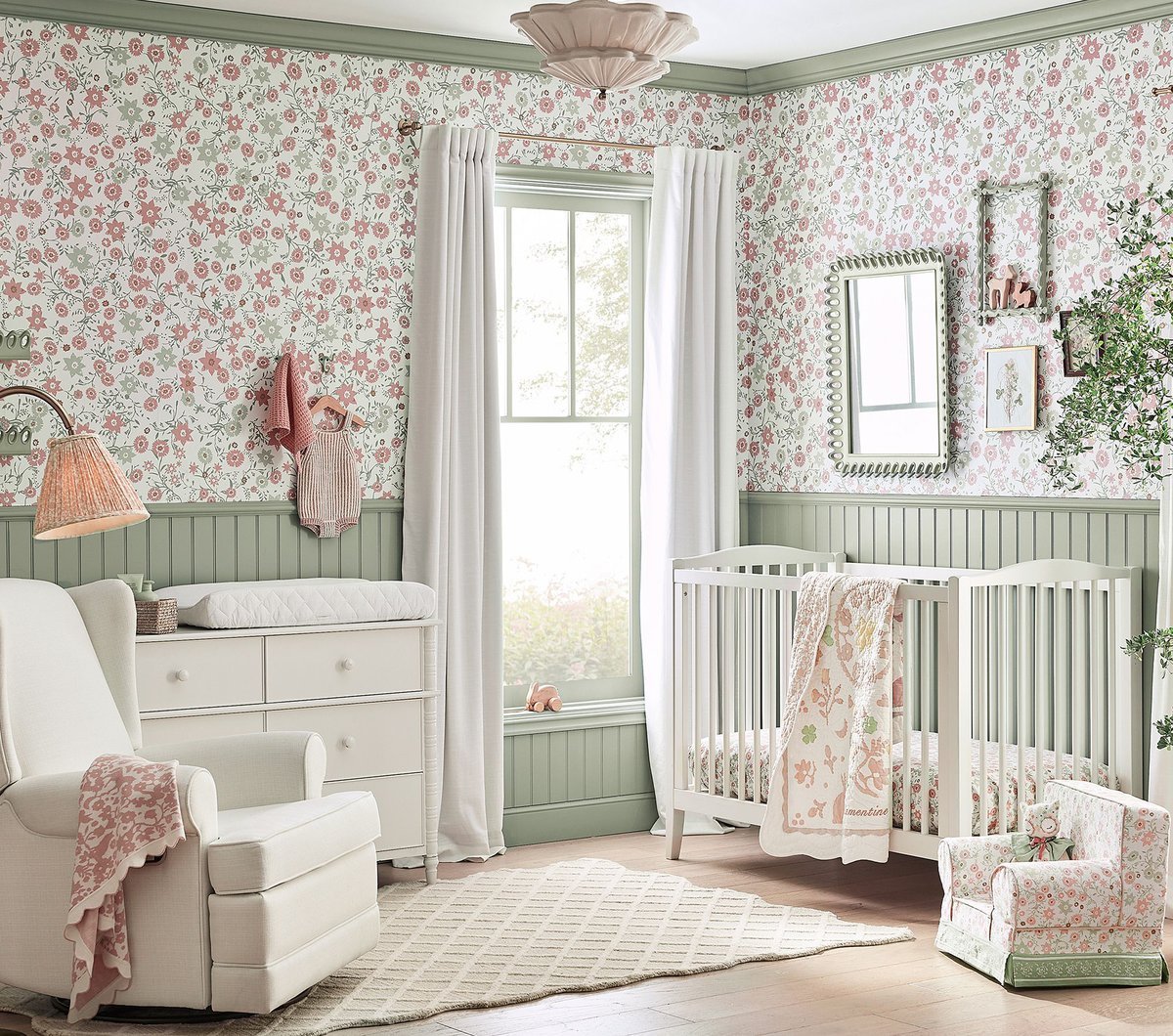 A child's nursery in green and floral patterns.