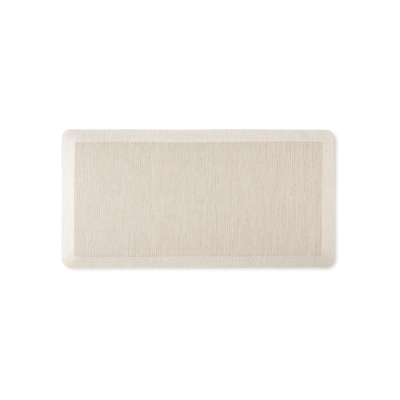 An anti-fatigue beige mat on a white background.