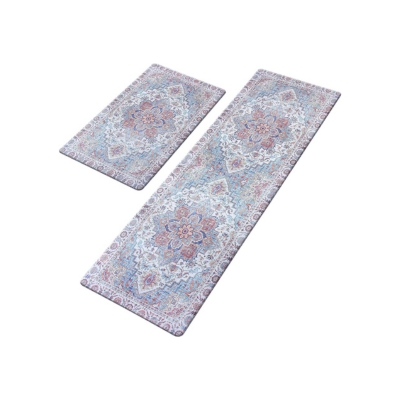 Two anti-fatigue kitchen mats with an ornate pattern on them.