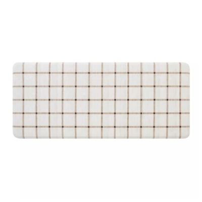 An anti-fatigue kitchen mat with a white and brown checkered pattern on a white background.