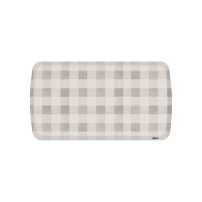 A beige and white checkered anti fatigue kitchen mat .