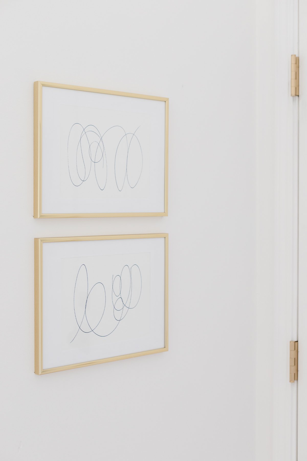 scribble art in gold frames