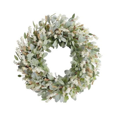 A circular fall wreath made of green and white foliage, accented with small white flowers and lush greenery.