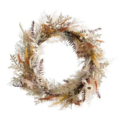 A fall wreath made of dried grasses and twigs.