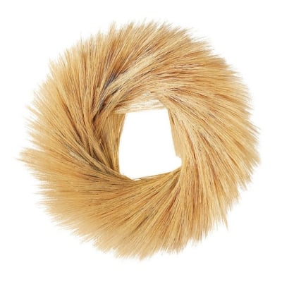 A tan fur scarf on a white background.