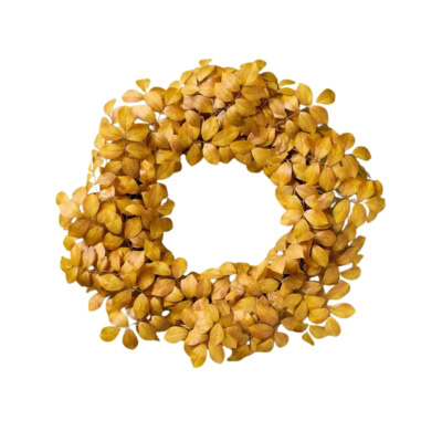 A fall wreath composed of small, dried yellow leaves arranged in a circular pattern against a white background.