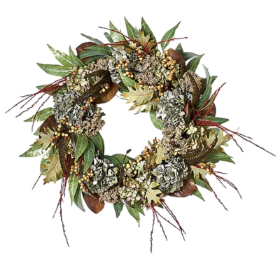 A fall wreath with leaves and berries on a white background.