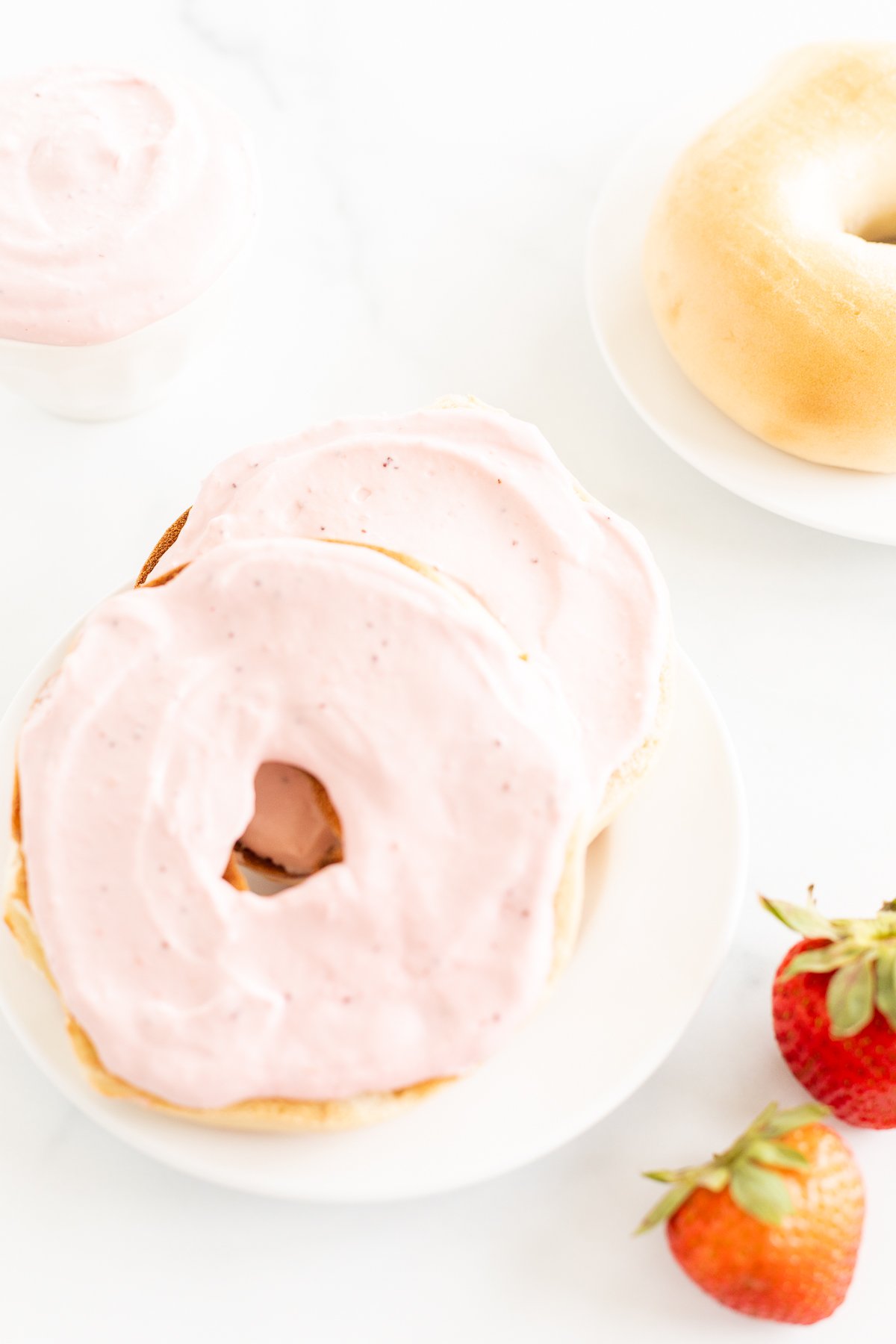 Strawberry cream cheese on a bagel.