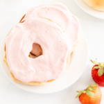 Strawberry cream cheese on a bagel.