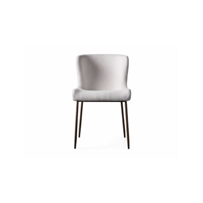 A dining chair with metal legs, perfect for those seeking an Arhaus look for less.