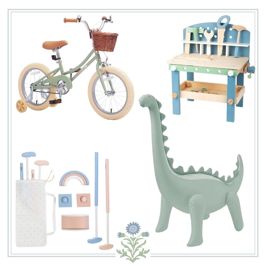 A collection of children's toys, perfect gift ideas including a bicycle and a dinosaur.