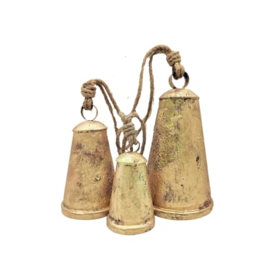 Three brass bells on a white background.