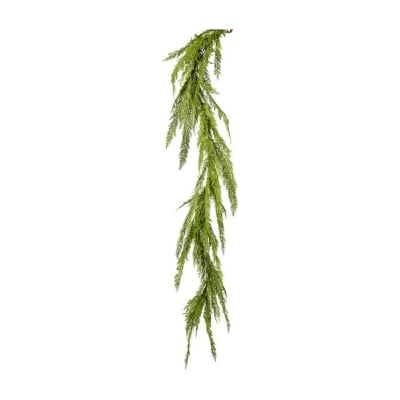 A green cedar garland hanging on a white background.