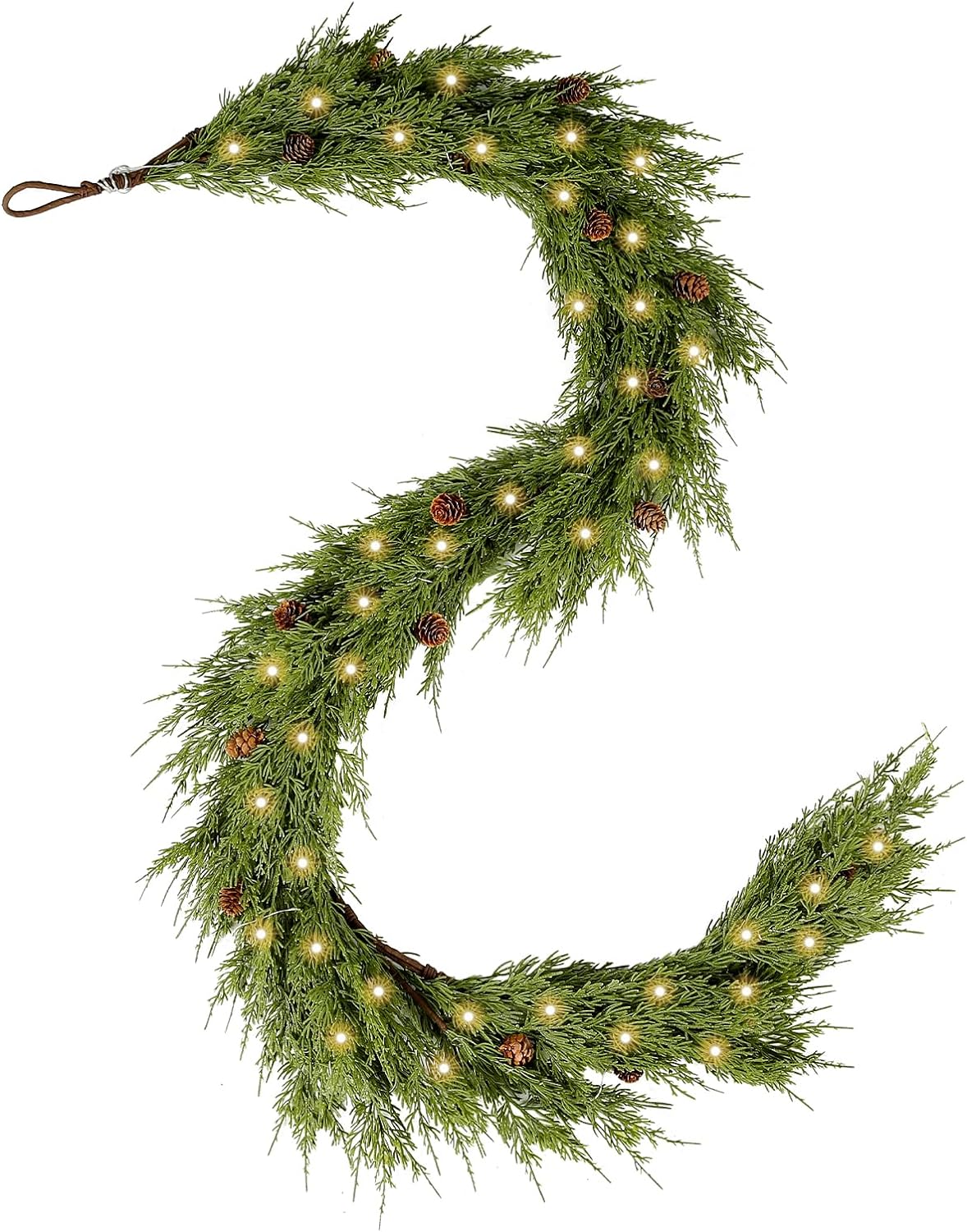 A cedar garland intertwined with pine needles and adorned with pine cones, creating a festive Christmas decoration.