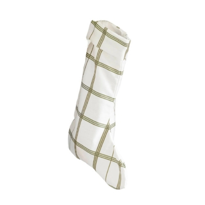 A white and green plaid stocking, one of the charming Christmas decorations, hanging on a white background.