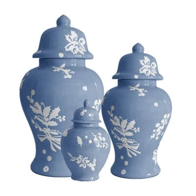 Three blue vases with floral designs, perfect as Christmas decorations.