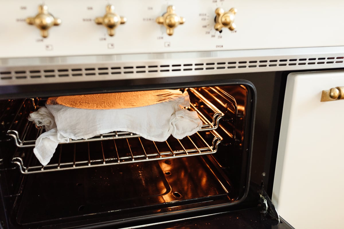 A white oven with a rack in it, perfect for baking Cookie Butter Cinnamon Rolls.