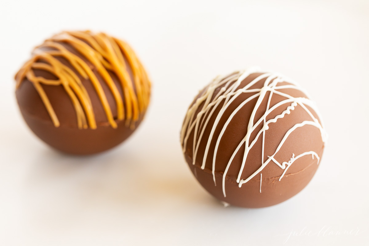 Two chocolate Easter eggs with icing, perfect for peanut butter lovers.