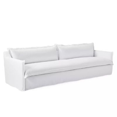 A white Serena and Lily Sofa with plush pillows.